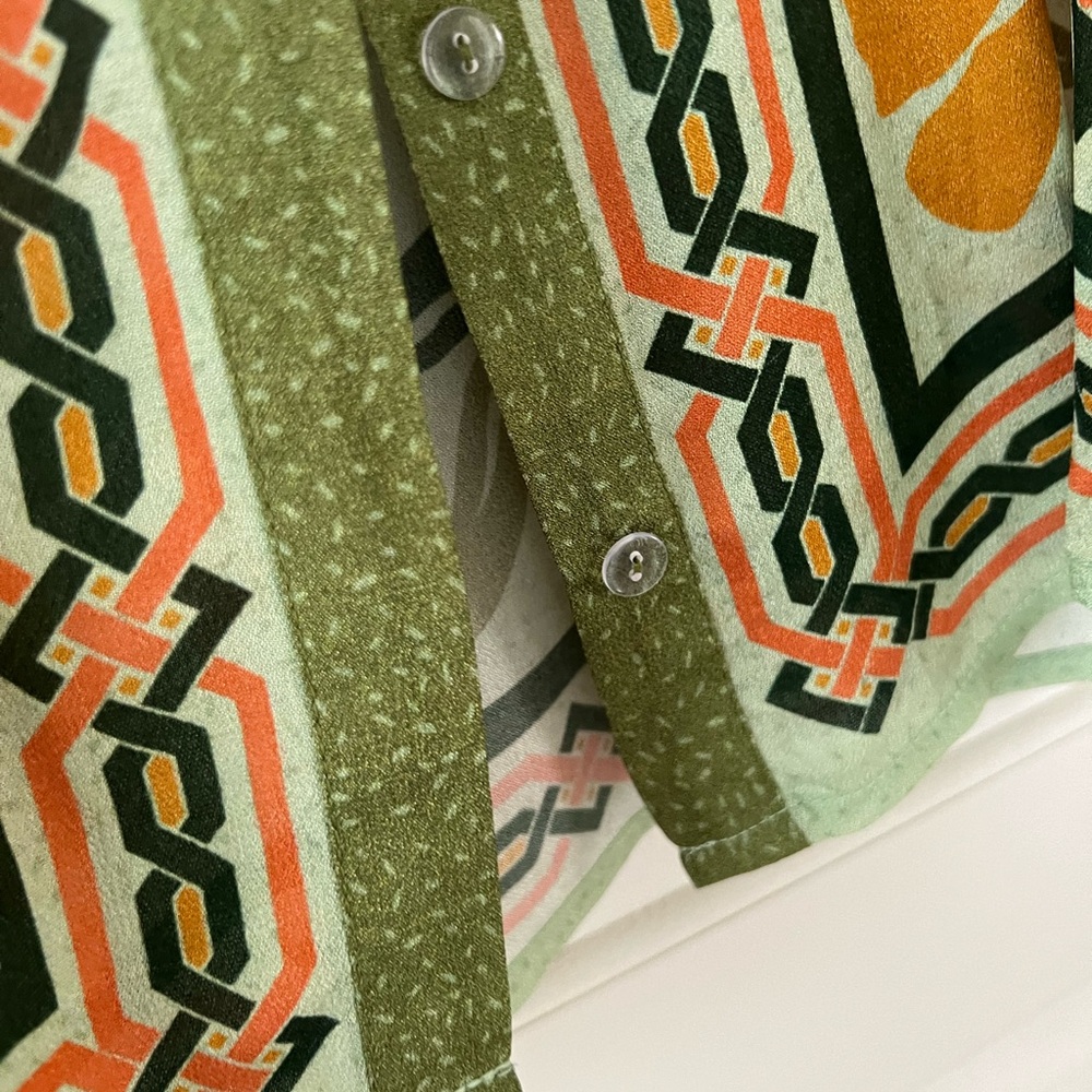 Long sleeve flirty fall top from Anthropologie